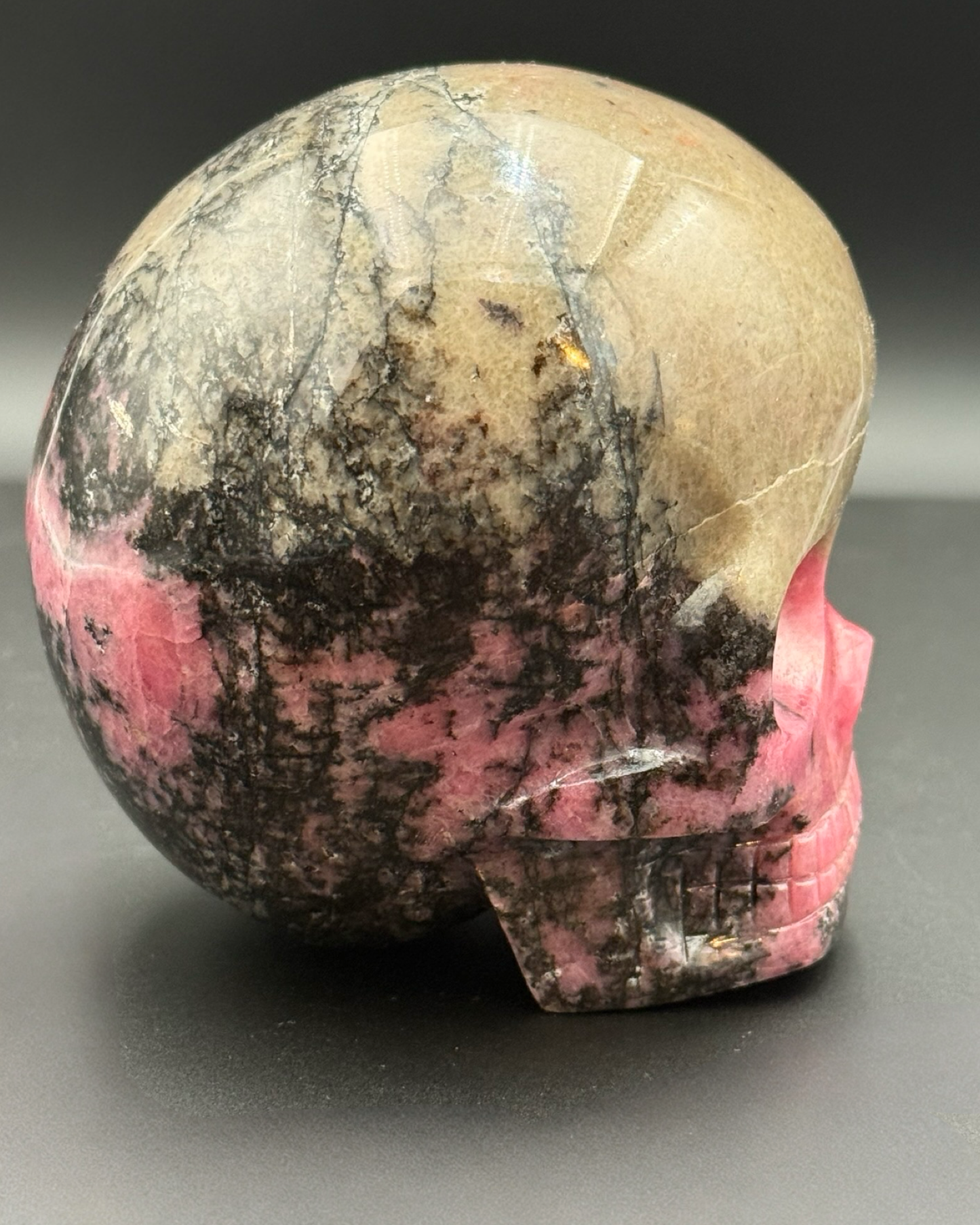 AAA Rhodonite Magical Child Skull by Leandro De Souza