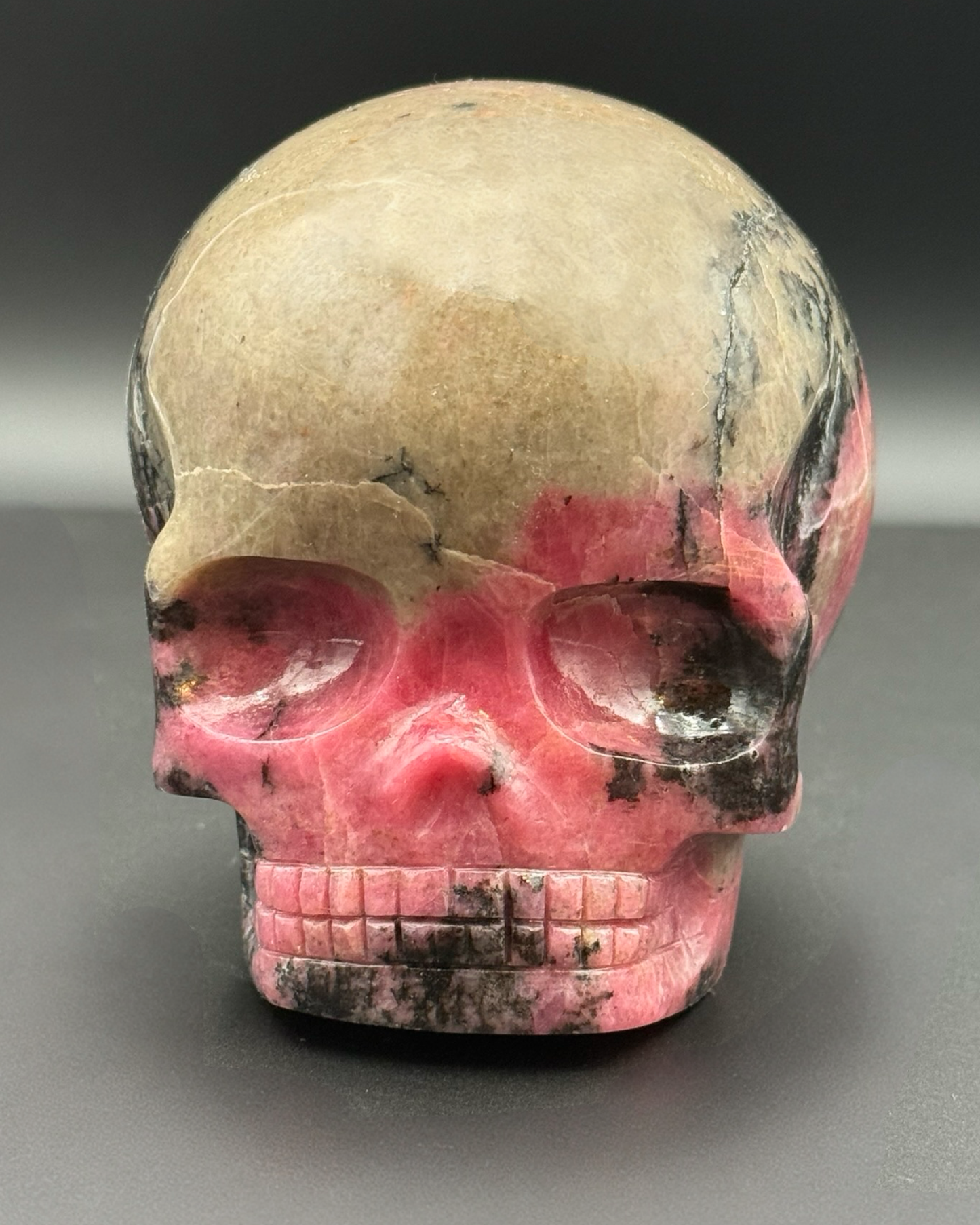 AAA Rhodonite Magical Child Skull by Leandro De Souza