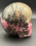 Load image into Gallery viewer, AAA Rhodonite Magical Child Skull by Leandro De Souza

