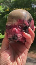 Load and play video in Gallery viewer, AAA Rhodonite Magical Child Skull by Leandro De Souza
